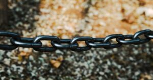 Close-up of a sturdy metal chain, representing backlinks and link building
