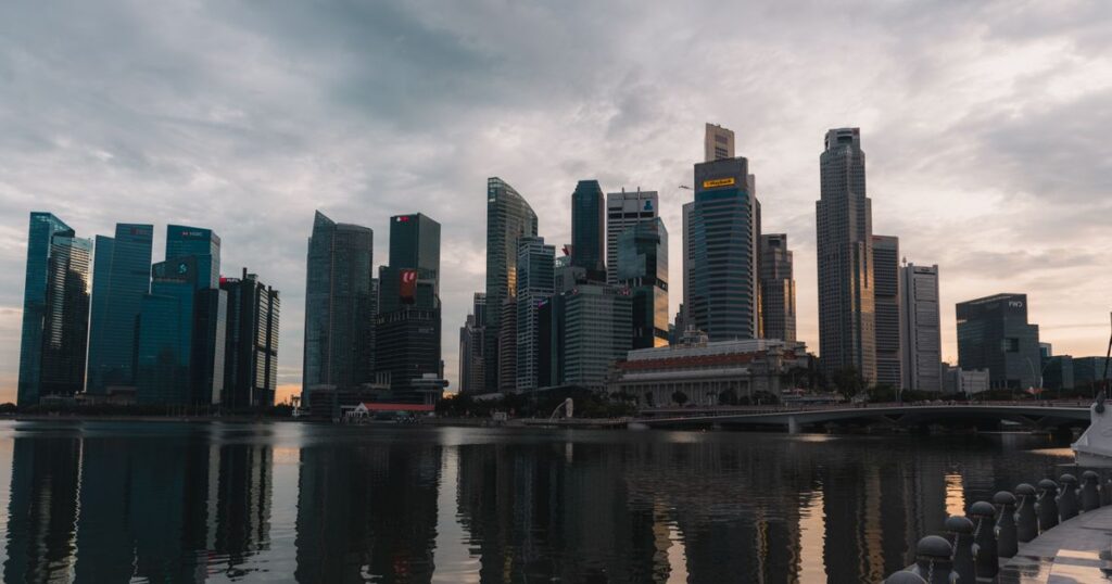 Singapore skyline reflected on the waterfront at dusk, representing local search visibility for Singapore businesses