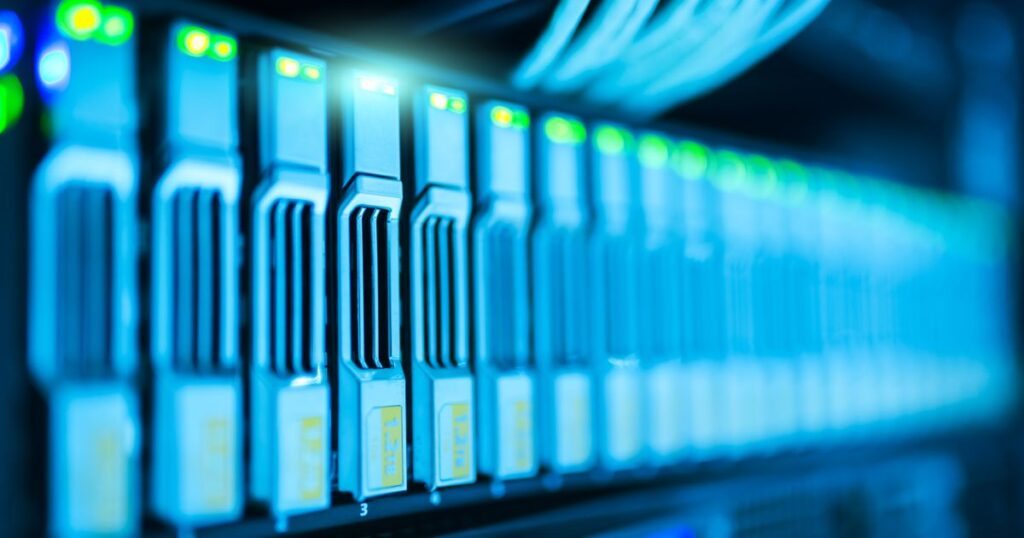 Server racks with glowing lights in a data centre, representing Meta Pixel and Conversions API tracking