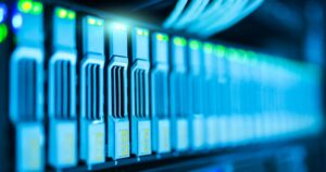 Server racks with glowing lights in a data centre, representing Meta Pixel and Conversions API tracking