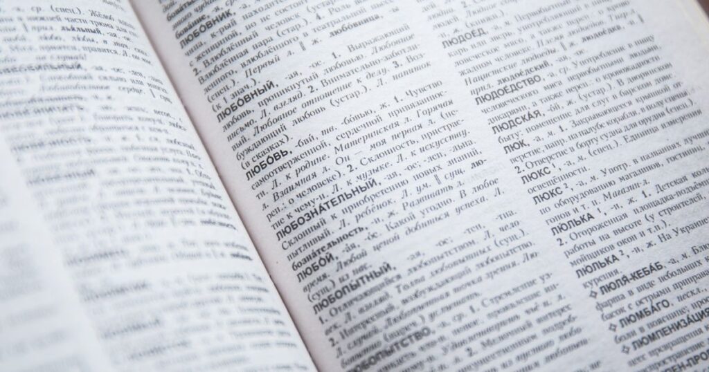Open dictionary showing detailed entries, representing multilingual SEO and translated content