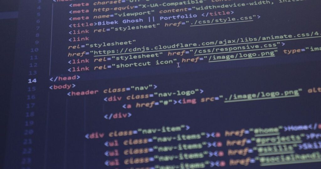Close-up of HTML and CSS code on a computer screen, representing structured data and schema markup