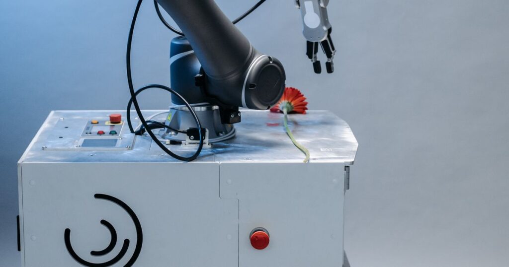 Industrial robot arm in a laboratory, representing automated Smart Bidding strategies