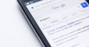 Smartphone showing Google search results for an analytics query