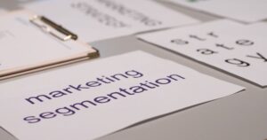 Marketing strategy documents spread across a desk during content planning.