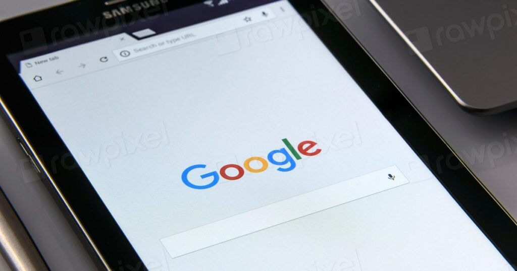 A Google search page open on a tablet screen, illustrating the search surfaces that GEO, AEO and LLM SEO all try to influence