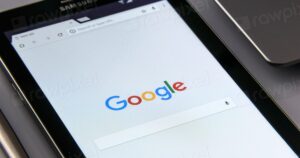 A Google search page open on a tablet screen, illustrating the search surfaces that GEO, AEO and LLM SEO all try to influence