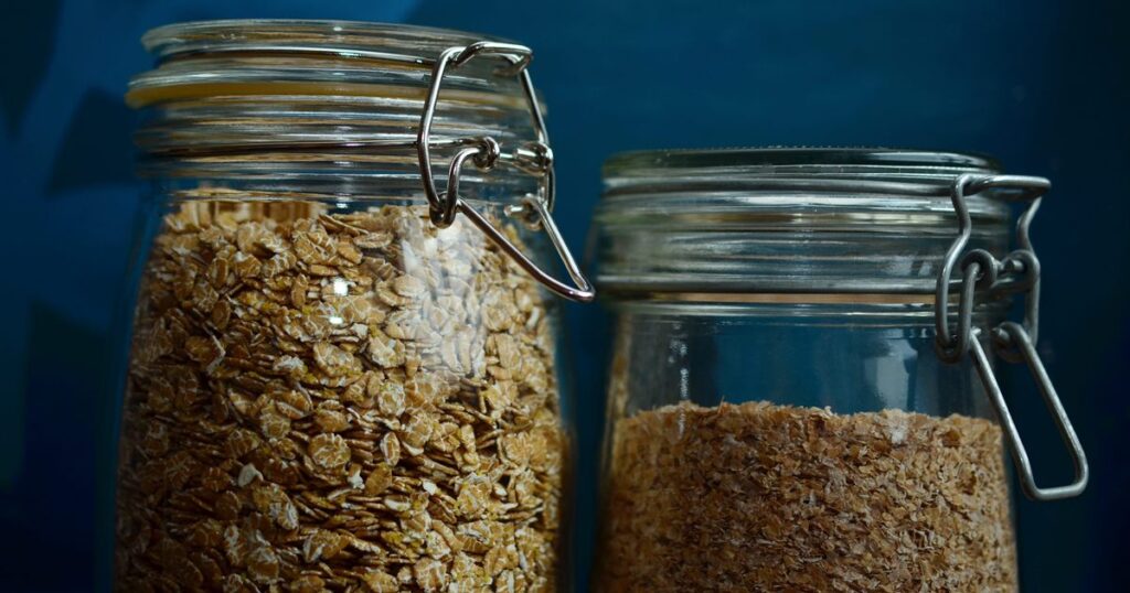Jars of spelt flakes and oats, the kind of wholegrain food whose fibre and nutrient claims are regulated in Singapore