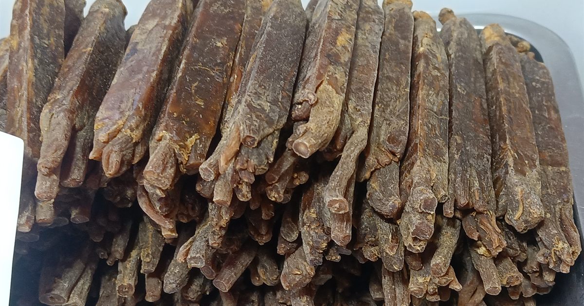 A tray of dried ginseng roots, a common traditional Chinese medicine ingredient, illustrating the rules on advertising TCM clinics in Singapore.