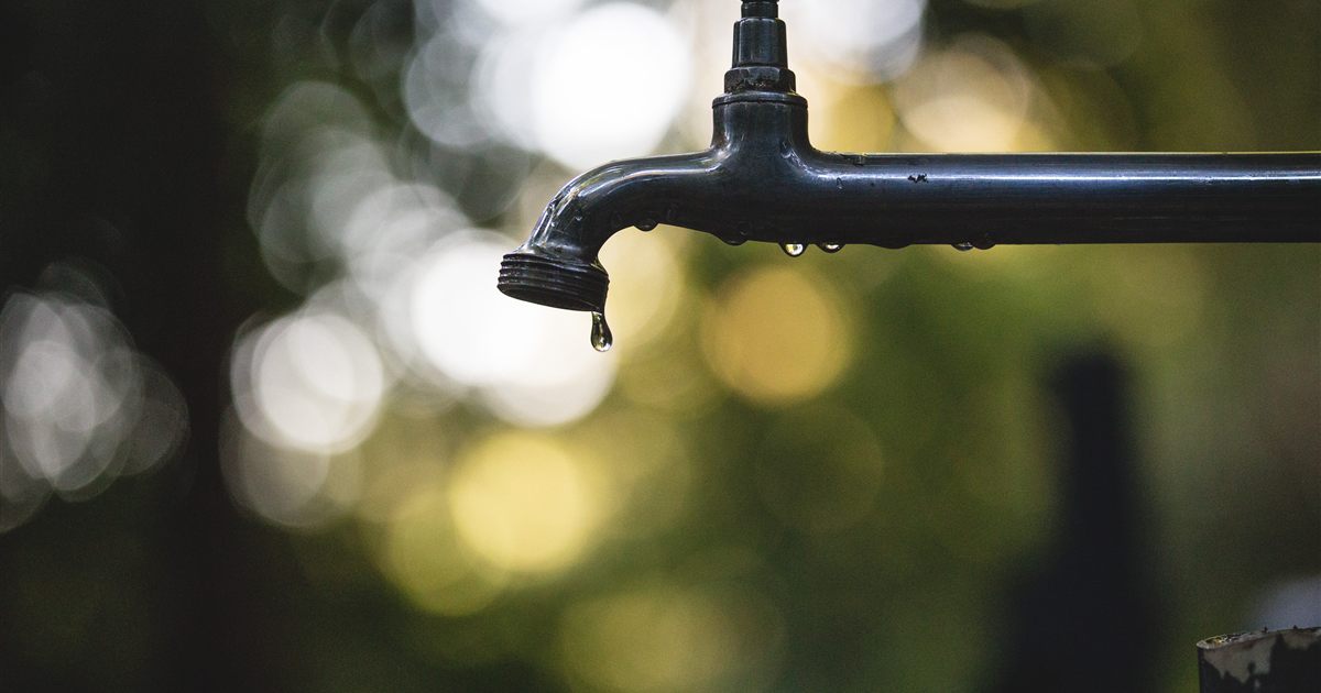 A metal outdoor water tap with a drop of water falling from the spout, illustrating the water efficiency label rules for advertising taps and water fittings in Singapore.